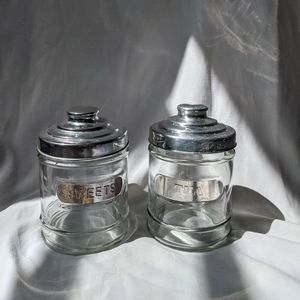 SET OF TWO CHROME AND GLASS CANISTERS